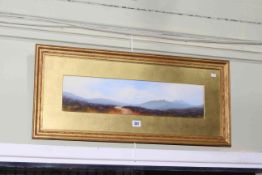 Ben Graham, Cragford, Dartmoor, watercolour, signed lower right, 12cm by 53cm, in gilt glazed frame.
