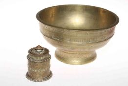 Eastern brass bowl and ornate lidded container.