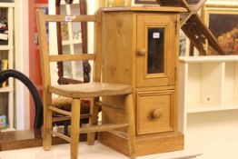 Child's chair and pine glazed door pedestal cabinet (2).