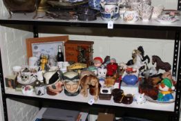 Collection of various china including Royal Doulton character jugs, Melba monkey, money boxes,