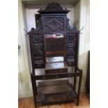 Early 20th Century carved oak mirror back hallstand, 202cm by 92cm.