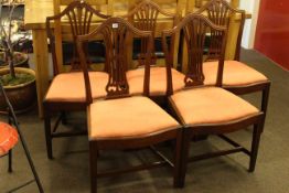 Set of five mahogany Hepplewhite style dining chairs.