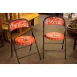 Pair novelty Coca Cola folding cafe chairs.