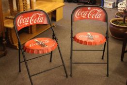 Pair novelty Coca Cola folding cafe chairs.