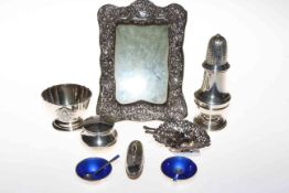 Collection of silver including photograph frame, sifter, pierced dish, pill box and nail buff,