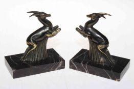 Pair of Art Deco style Gazelles on marble bases.