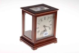 Mahogany framed four glass sided mantel clock 19cm.