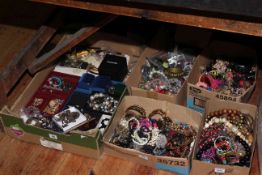 Five boxes of costume jewellery.