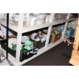 Large shelf collection of ceramics, glass, fabrics, quilts, linens, silver frame and spoon,