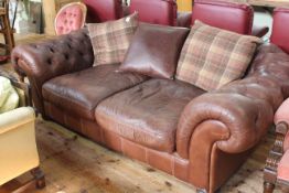 Large deep buttoned brown leather Chesterfield settee with reversible back cushions 230cm x 120cm.