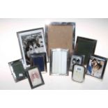 Collection of silver photograph frames.