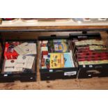 Three boxes of Lledo, Matchbox and other model vehicles.