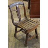 Rustic cartwheel chair.