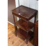 Brass inlaid three tier etagé with frieze drawer, 75cm by 41cm.