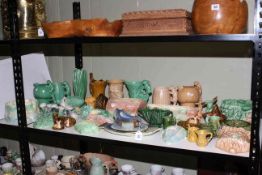 Shelf collection of Sylvac including wall plaques, planters, vases, jugs, etc.