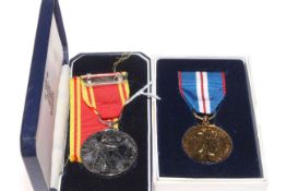 A For Exemplary Fire Service Medal to LDC Firefighter John Guy,