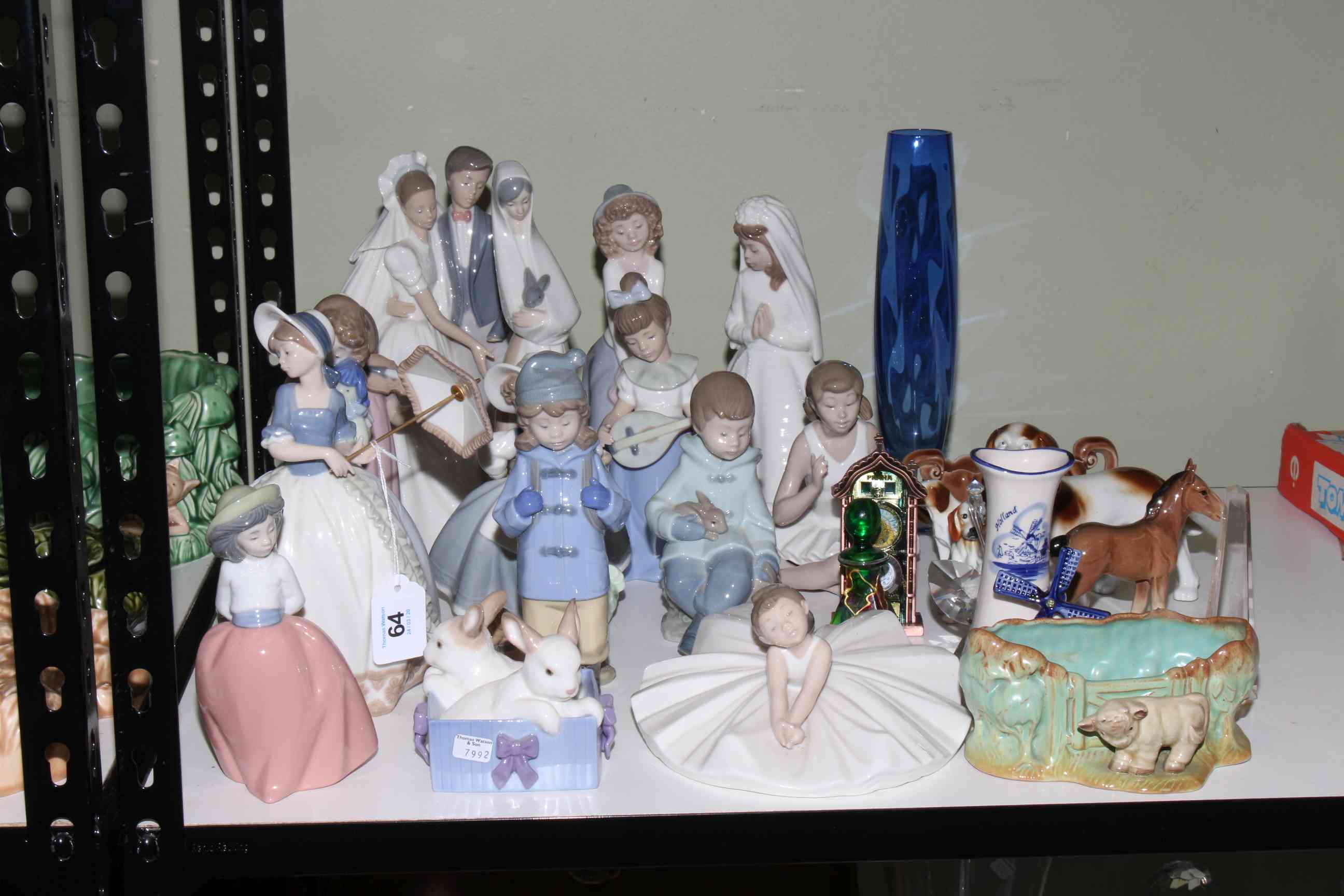 Collection of Nao figures, Hornsea, Sylvac, Wade.