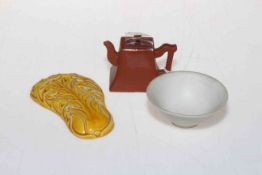 Chinese yellow glazed weight, red ware miniature teapot and unglazed bowl (3).