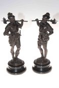 Pair metal warrior figures on ebonised bases 38cm.