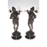 Pair metal warrior figures on ebonised bases 38cm.