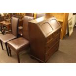 Oak three drawer bureau and four faux leather dining chairs (3x1).