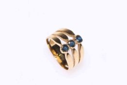 9 carat gold 'three band' sapphire ring, size R.