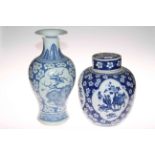 Chinese black lacquer storage table 47cm x 36cm diameter and two blue and white Chinese vases.