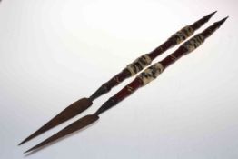Pair of African tribal daggers, 79cm.
