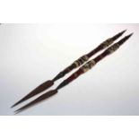 Pair of African tribal daggers, 79cm.