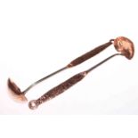 Pair of Arts & Crafts hammered copper ladles, 44cm.