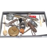 Tray of collectables including corkscrews, pipe, lighter, letter opener, etc.