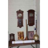 Two oak wall clocks, walnut mantel clock, brass warming pan, copper posser and horn, maps,
