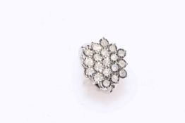 Large diamond cluster ring, with nineteen stones, total approximately 1 carat set in 9 carat gold,