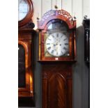 Early 19th Century mahogany eight day longcase clock, having painted arch dial signed W.