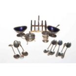 Silver five bar toast rack, set of six silver spoons, three silver commemorative spoons and salts.