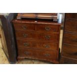 Burr and chequer inlaid chest of two short above three long drawers on ogee bracket feet,