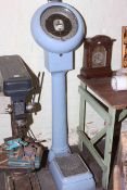 Vintage Avery coin operated personal scales.