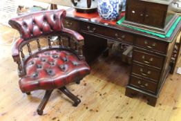 Mahogany eight drawer pedestal desk 75cm x 121cm and ox blood deep buttoned leather Captains style