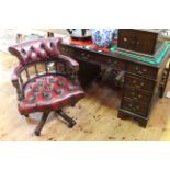 Mahogany eight drawer pedestal desk 75cm x 121cm and ox blood deep buttoned leather Captains style