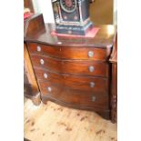 Mahogany serpentine front chest of four long drawers, 90cm by 90.5cm.