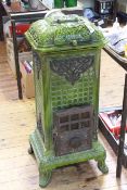 A. Martin Art Nouveau cast iron wood burning stove in emerald green, 99cm by 42cm.