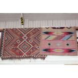 Two Turkish rugs with a geometric design, 3.00 by 1.52 and 2.10 by 1.15.
