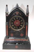 Victorian marble clock in Gothic style, having rouge and green marble half columns and decoration,