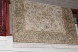 Green and beige ground Ziegler style carpet, 2.30 by 1.53.