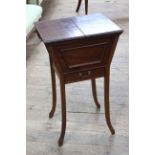 Mahogany sewing table having double hinged top above a single drawer on splayed legs, 46cm by 75cm.