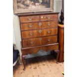 Antique walnut and line inlaid chest of two short above three long graduated drawers on cabriole