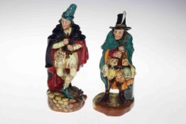 Two Royal Doulton figures, The Mask Sellar and The Pied Piper.