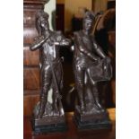 Large pair of bronze figures, one with pipe and rifle, the other a military drum, on marble bases,