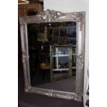 Large ornate silvered frame bevelled wall mirror, 183cm by 134cm overall.