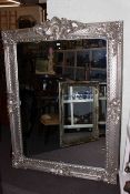 Large ornate silvered frame bevelled wall mirror, 183cm by 134cm overall.